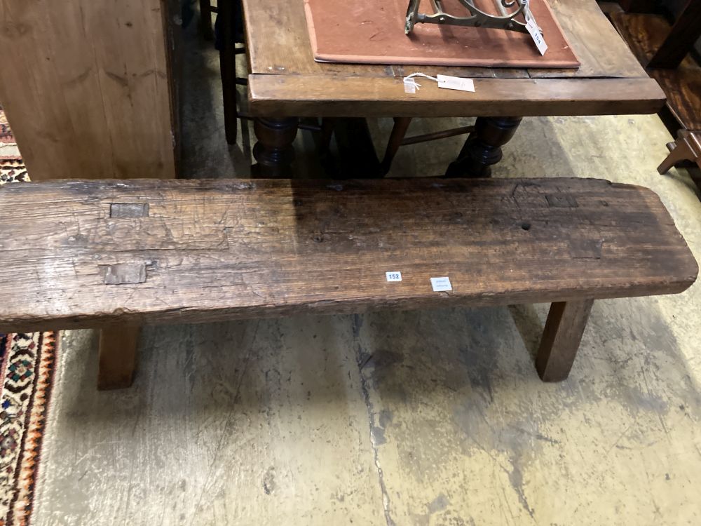 An antique pine bench, width 160cm depth 33cm height 42cm